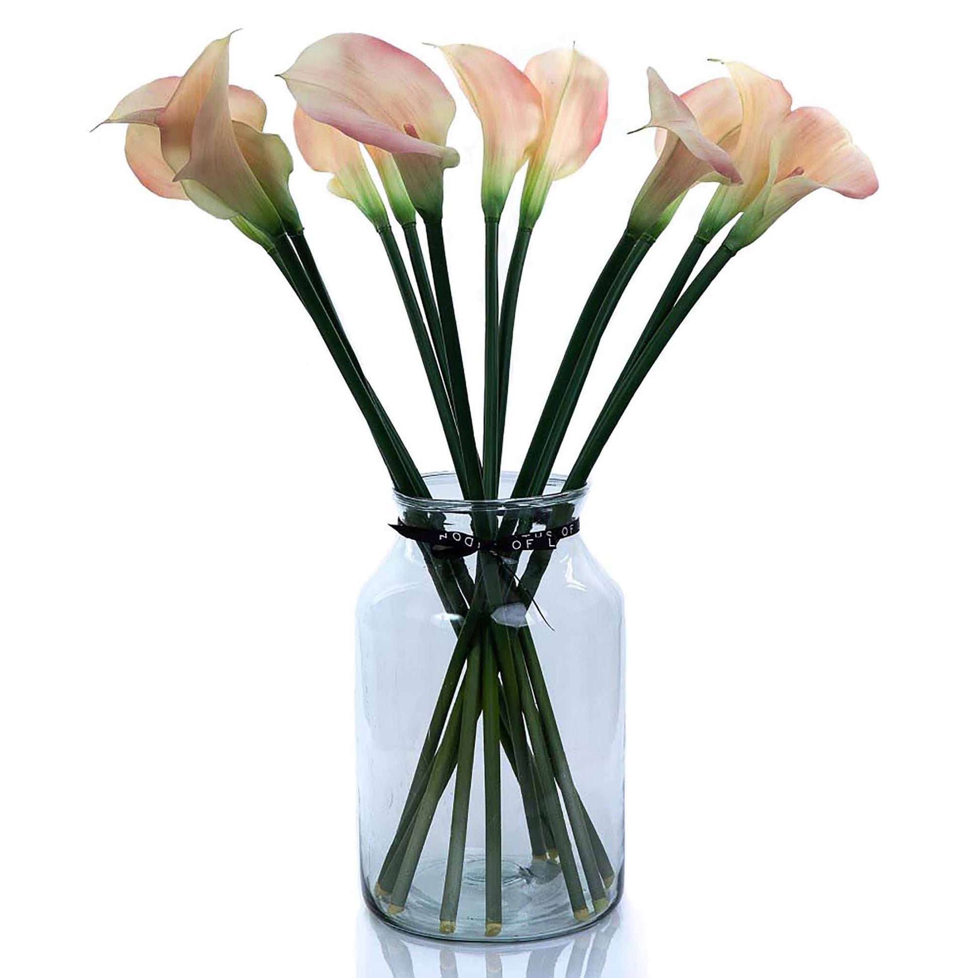 Pink faux calla lily arrangement in apothecary vase