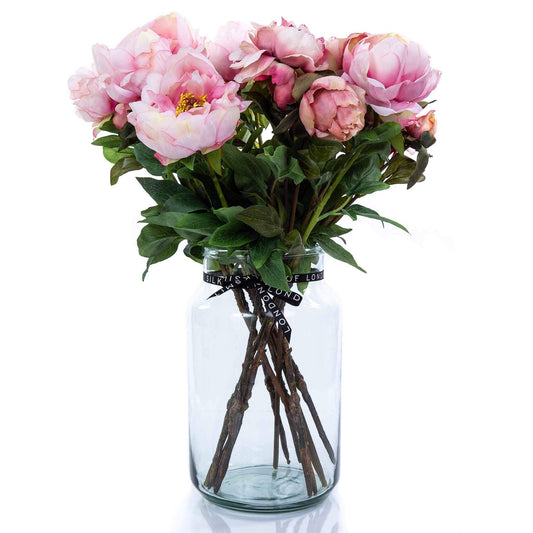 Faux pink peony bouquet in apothecary vase