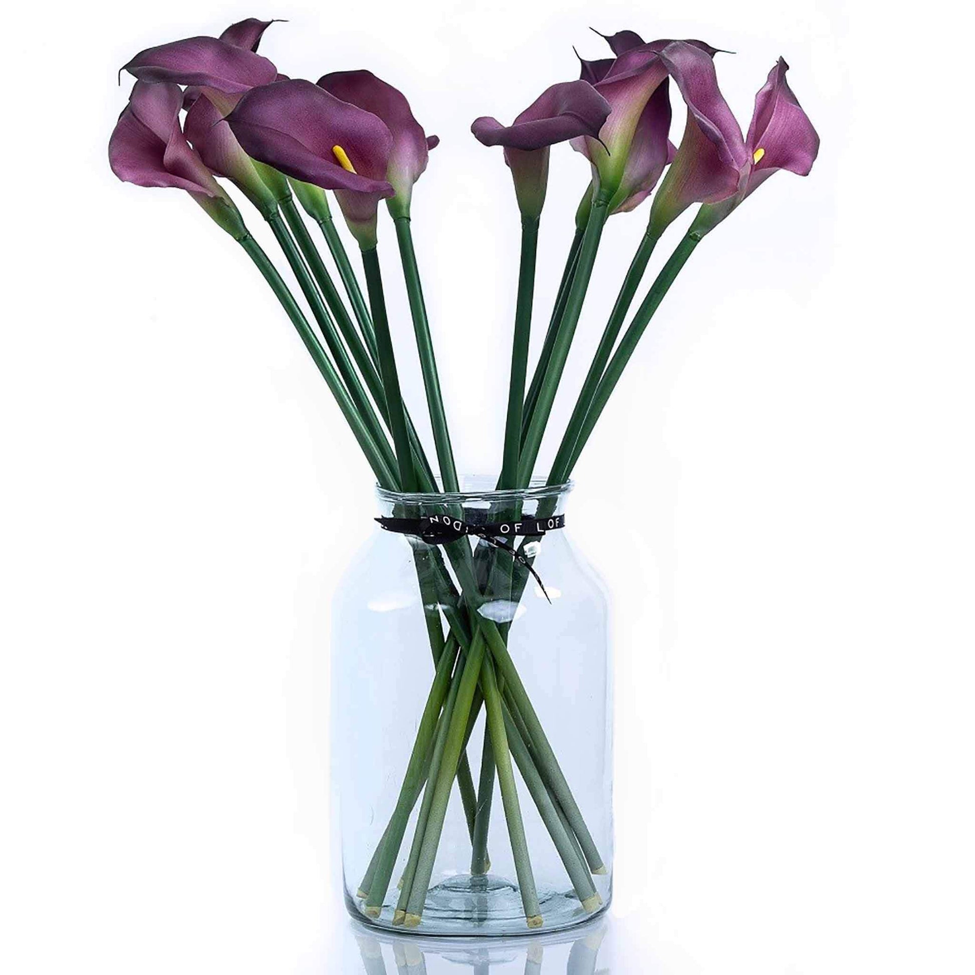 Dark plum faux calla lilies in apothecary vase