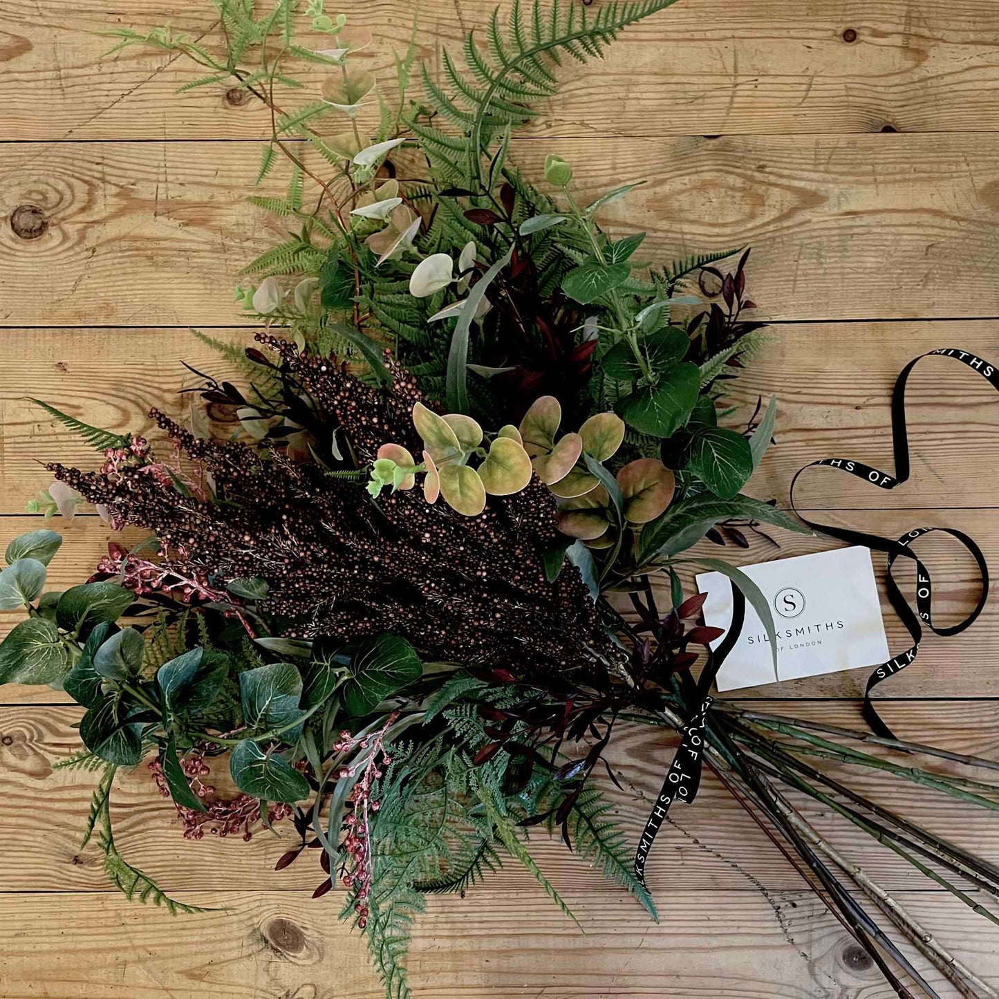 Winter fern and foraged berry faux bouquet