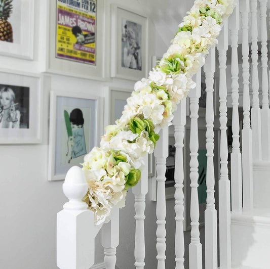 Spring faux hydrangea garland on banister